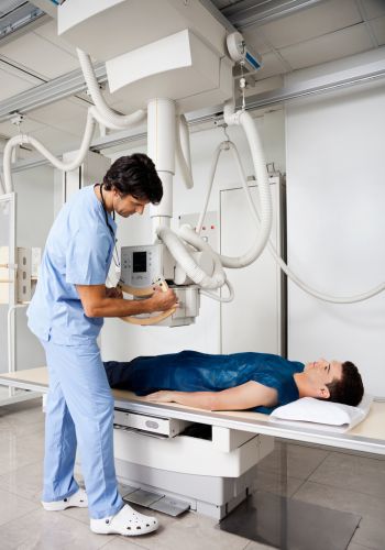 Patient undergoing x-rays scanning
